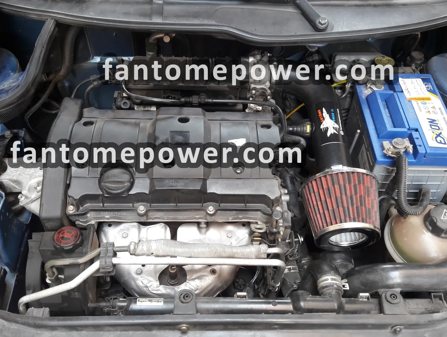 installed air intake kit on Peugeot 206